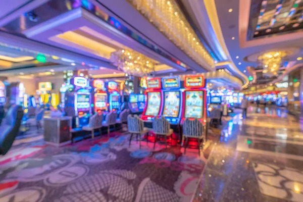 Mobile phone displaying Live Draw stream with ball machine, numbers, and croupier